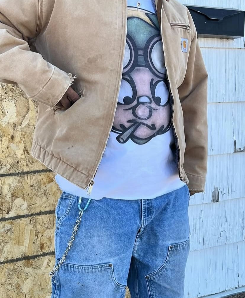 Customer wearing the Vertidíem Fight for Freedom tee under a tan work jacket